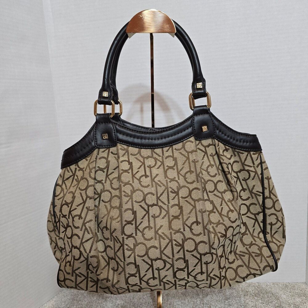 Calvin Klein canvas khaki/brown shoulder satchel bag